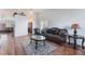 Comfortable living room with stylish furniture, rug, and decor at 2117 Mountain Sunset Ave, North Las Vegas, NV 89031