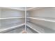 A pantry with white shelving and textured shelf liners, ready for organized storage and provisions at 2117 Mountain Sunset Ave, North Las Vegas, NV 89031
