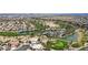 Expansive community featuring a golf course with well-manicured greens and lush landscaping at 236 Dog Leg Dr, Las Vegas, NV 89148