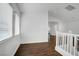 Bright hallway with laminate flooring and staircase at 236 Dog Leg Dr, Las Vegas, NV 89148