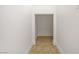 Hallway featuring tiled floors and white walls at 236 Dog Leg Dr, Las Vegas, NV 89148