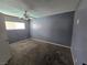 Bedroom featuring carpet, window with natural light, neutral wall color, and ceiling fan at 2501 Capistrano Ave, Las Vegas, NV 89121
