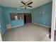 Dining room features tile flooring, window, and ceiling fan at 2501 Capistrano Ave, Las Vegas, NV 89121