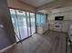 Open kitchen showcasing modern appliances and natural light from the sliding doors to the back patio at 2501 Capistrano Ave, Las Vegas, NV 89121