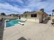 Backyard pool with diving board and sunny skies at 2501 Capistrano Ave, Las Vegas, NV 89121