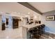 Eat-in kitchen featuring granite counters, stainless appliances and breakfast bar at 2721 Family Ct, Las Vegas, NV 89117