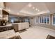 Open kitchen boasts granite counters, stainless steel appliances, and breakfast bar at 2721 Family Ct, Las Vegas, NV 89117