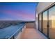 Spacious balcony with stunning city views, perfect for outdoor relaxation and entertaining at 350 Solitude Peak Ln, Henderson, NV 89012