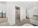 Modern bathroom with shower, dual sinks, and tile floors, designed for relaxation at 350 Solitude Peak Ln, Henderson, NV 89012