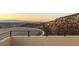 This hillside home enjoys stunning views of the Las Vegas valley and surrounding mountains at 350 Solitude Peak Ln, Henderson, NV 89012