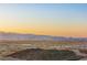 Enjoy stunning views of the Las Vegas skyline and surrounding mountains from this homesite at 350 Solitude Peak Ln, Henderson, NV 89012