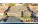 Aerial view of home with landscaped yard and three-car garage at 3658 Auckland Castle St, Las Vegas, NV 89135