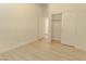 Well-lit bedroom with hardwood floors and closet at 3658 Auckland Castle St, Las Vegas, NV 89135