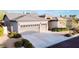 Well maintained home featuring a three car garage, neutral color palette and manicured landscaping at 3658 Auckland Castle St, Las Vegas, NV 89135