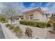 Charming single-story home featuring a well-maintained yard with gravel landscaping and mature trees at 3658 Auckland Castle St, Las Vegas, NV 89135