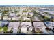 An aerial view of a densely populated neighborhood with mature landscaping and tile roofs at 3658 Auckland Castle St, Las Vegas, NV 89135