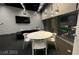 Amenity space with a large table, city views and a lounge at 3722 Las Vegas Blvd # 1205, Las Vegas, NV 89158