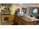 Well-equipped kitchen featuring modern stainless steel appliances, wooden cabinets, and ample countertop space at 3722 Las Vegas Blvd # 1205, Las Vegas, NV 89158