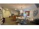 Contemporary kitchen and dining area with modern lighting and a dining table at 3722 Las Vegas Blvd # 1205, Las Vegas, NV 89158