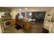 Open kitchen featuring modern appliances, cabinetry, and connecting living space at 3722 Las Vegas Blvd # 1205, Las Vegas, NV 89158
