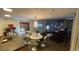 Open-concept living room with modern furnishings, chandelier and city views through floor-to-ceiling windows at 3722 Las Vegas Blvd # 1205, Las Vegas, NV 89158