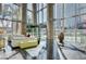 Elegant building lobby with sleek marble floors, floor-to-ceiling windows, modern furniture, and a stylish decorative vase at 3722 Las Vegas Blvd # 1205, Las Vegas, NV 89158