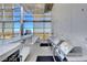 Modern outdoor kitchen with stainless steel appliances, a bar, and city views at 3722 Las Vegas Blvd # 1205, Las Vegas, NV 89158
