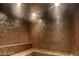 Relax in a luxurious spa with tiled walls, integrated benches, and recessed lighting, creating a serene atmosphere at 3722 Las Vegas Blvd # 1205, Las Vegas, NV 89158