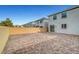 Paved backyard patio extending between neighboring houses at 3736 Paseo De Paz Ave, Las Vegas, NV 89115