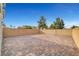 Expansive brick-paved backyard patio bordered by a wall at 3736 Paseo De Paz Ave, Las Vegas, NV 89115