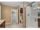 Bathroom featuring a modern shower with tiled walls and access to the bedroom at 3736 Paseo De Paz Ave, Las Vegas, NV 89115