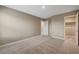 Bright and spacious bedroom leading to a closet and bathroom at 3736 Paseo De Paz Ave, Las Vegas, NV 89115