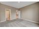Spacious carpeted bedroom featuring two entrances, recessed lighting, and neutral colored walls at 3736 Paseo De Paz Ave, Las Vegas, NV 89115