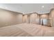 This empty loft space has recessed lighting, neutral colors, and soft carpeting throughout at 3736 Paseo De Paz Ave, Las Vegas, NV 89115