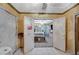 Room features doors opening to a bedroom, a sliding-door closet, and a ceiling fan at 405 Longtree Ave, Henderson, NV 89011