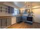 Efficient kitchen with gray cabinetry, modern appliances, and ample counter space at 436 Emden St, Henderson, NV 89015