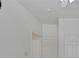 Bright white bedroom with ample lighting and neutral decor at 4828 Marco Polo St, North Las Vegas, NV 89031