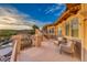 Relax on this spacious balcony with comfortable seating and beautiful views of the surrounding landscape at 5 Via Ravenna Ct, Henderson, NV 89011