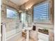 Charming bathroom with tiled walls, shower/tub, and vanity at 5 Via Ravenna Ct, Henderson, NV 89011