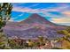 Picturesque view of a Primary-planned community nestled against a majestic mountain backdrop at 5 Via Ravenna Ct, Henderson, NV 89011