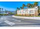 Elegant community entrance with lush landscaping, palm trees, and easy access at 5 Via Ravenna Ct, Henderson, NV 89011