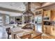 Open-concept kitchen with stainless steel appliances, granite countertops, and a large island perfect for entertaining at 5 Via Ravenna Ct, Henderson, NV 89011