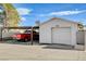Garage and carport in neutral colors with red truck visible, offering parking at 516 Arizona St, Boulder City, NV 89005