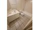 Clean bathroom featuring a vanity, toilet, and tub at 5316 Clover Blossom Ct, North Las Vegas, NV 89031