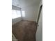 Simple bedroom with natural light from the windows at 5316 Clover Blossom Ct, North Las Vegas, NV 89031