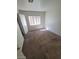 Plain bedroom features a window providing light at 5316 Clover Blossom Ct, North Las Vegas, NV 89031
