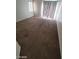 Basic bedroom with window and carpet flooring at 5316 Clover Blossom Ct, North Las Vegas, NV 89031