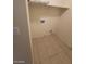 Simple laundry area features essential hookups and shelf storage at 5316 Clover Blossom Ct, North Las Vegas, NV 89031