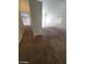 Expansive living room with carpet floors and great natural light throughout the area at 5316 Clover Blossom Ct, North Las Vegas, NV 89031