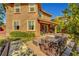 View of back exterior, patio and backyard at 5662 Escamilla Rd, Las Vegas, NV 89135